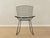 BERTOIA Chair, Model 420, based on a 1940s design by Harry Bertoia for Knoll. Wire mesh frame with a new gray seat...