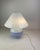 Large table lamp made of white satin Murano Glass with dark and baby blue lines and a white metal structure. Designed in a...