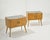 A stunning pair of vintage bedside tables, a classic example of Italian-made Midcentury Modern furniture dating back to...