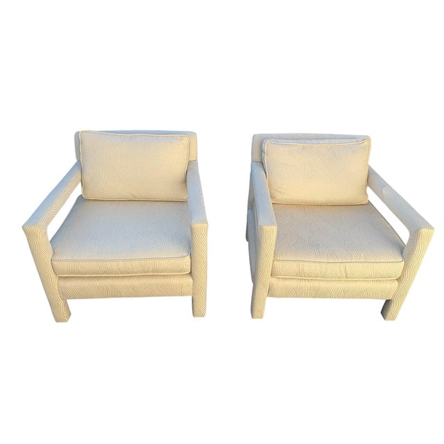Mid-century arm Parsons Chairs, a set. The are upholstered in a textured off white fabric. Solid sturdy chairs.