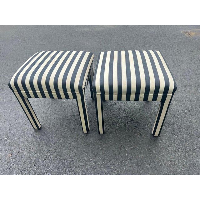 Pair of Striped Square Ottomans in the style of Billy Baldwin. These Parson style stools are black and off white although...