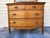 Antique American tiger oak bow-front dresser with a removable beveled swivel mirror. Manufactured by A.H. Heilman &...