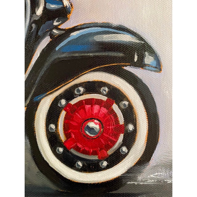 This oil on canvas artwork presents a close-up view of a Vespa Primavera 125, capturing the sleek lines and distinctive...