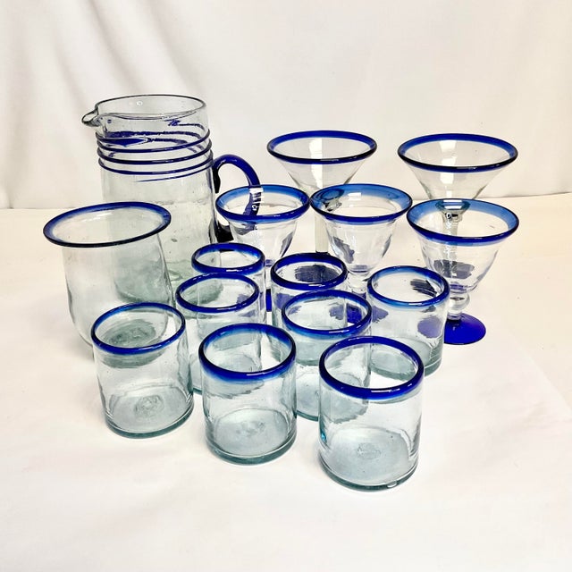 Mexican Hand Blown glass is thick and features random bubbles. This is a set of 15 pieces of barware in the traditional...