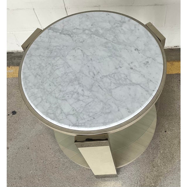 Original retail $1780, Neoclassical inspired light Caracole Modern Oculus End Table, beige chevron wood frame in the...