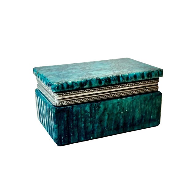 A hand carved alabaster trinket box with silver plate trim. Circa 1950s, Italy.