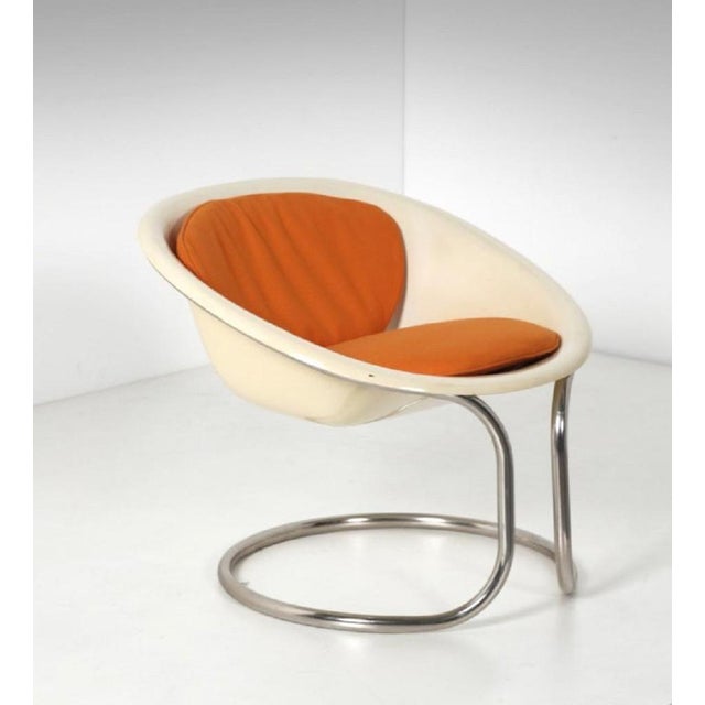 Small fiberglass armchair is an original design work realized in the 1970s. Original metal, fabric and fiberglass. Made in...