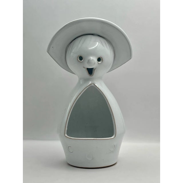 A charming white glazed candle lantern made in the 1960’s.