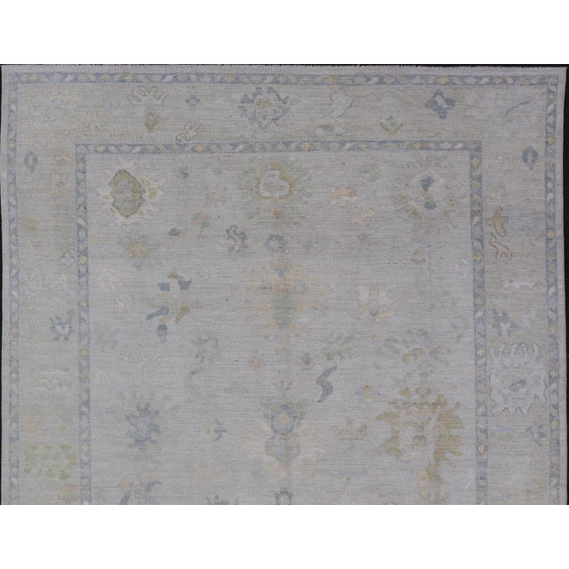 Cream Modern Tribal Oushak With a Cream Border and Light Gray-Blue Background For Sale - Image 8 of 13