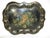 An antique hand-painted Victorian tole scalloped tray. It is painted black and decorated with a muted floral center in...