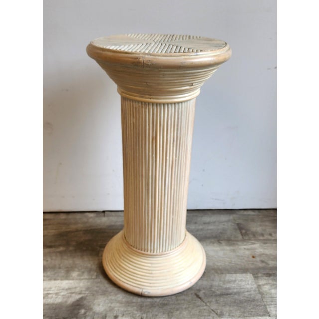 This striking vintage split reed rattan pedestal column adds versatility to any room as a pedestal for sculpture, a plant...