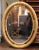 Mid 20th Century Mid-20th Century French Oval Giltwood Mirror With Floral Motifs For Sale - Image 5 of 10