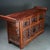 An exquisite vintage Chinese carved hardwood table, styled after traditional Huanghuali. This table features a flat top...