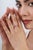 This three-stone band features 0.83 carats of radiant, vibrant emerald-cut rubies, set in 14k yellow gold. The three main...