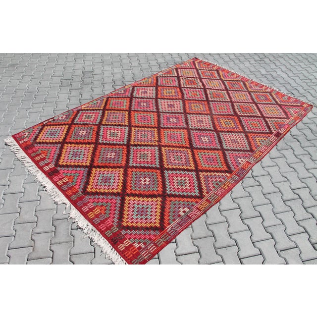 This beautiful, vintage, handwoven Kilim is approximately 60 years old. It is handmade of very fine quality, hand-spun...