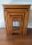 This set of four Asian carved wood nesting side tables is believed to date to the 1960s. The front and sides of the three...