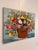 Large original floral still life by Francis “Duke” Downs, longtime Palm Beach County, Florida artist. Downs depicts an...