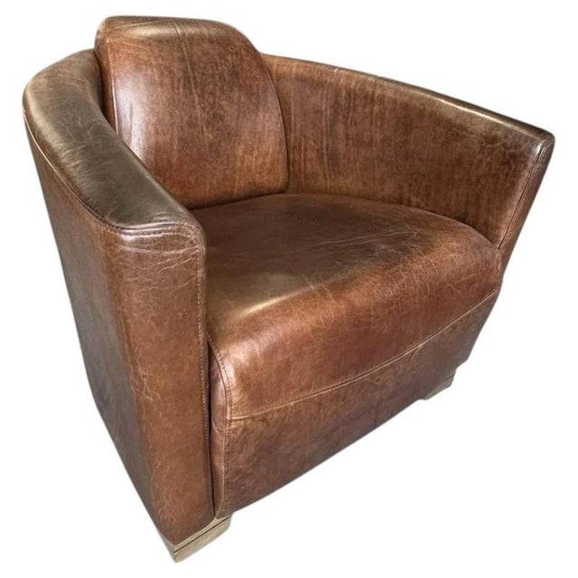 A handsome leather club armchair combining the character of traditional seating with a clean, contemporary silhouette....