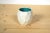 Porcelain tableware at a low resolution. Instead of smooth shapes, this pottery made piece is built up out of polygons. It...