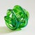 A beautiful vintage art glass knot. Vibrant green color to the glass. A great sculptural accent piece. Measures 5"W x...