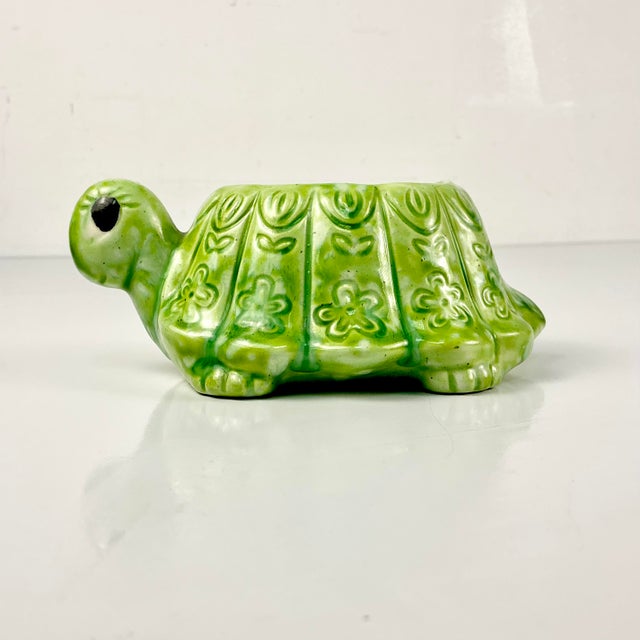 This little guy is adorable. The Turtle ceramic planter is an unsigned Folk Art piece crafted in the 1970s at a pottery...