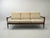 An exceptional Scandinavian Modern three-seat sofa from the 1960s, featuring a sculptural design language strongly...