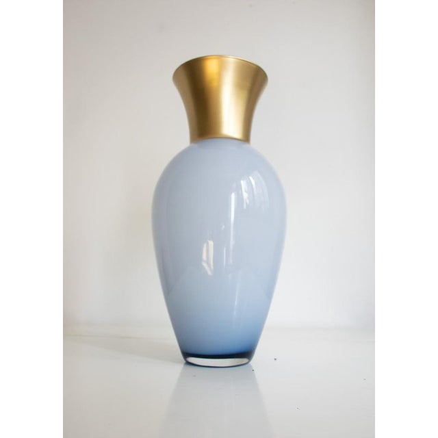 Elegant Venini-style vase in indigo color designed by Mariana Iskra for Ribes Studio, produced in Murano and decorated in...