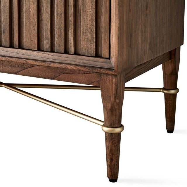 Made of American walnut the matte finish recalls mid 20th century Swedish furniture. The extensively designed console...