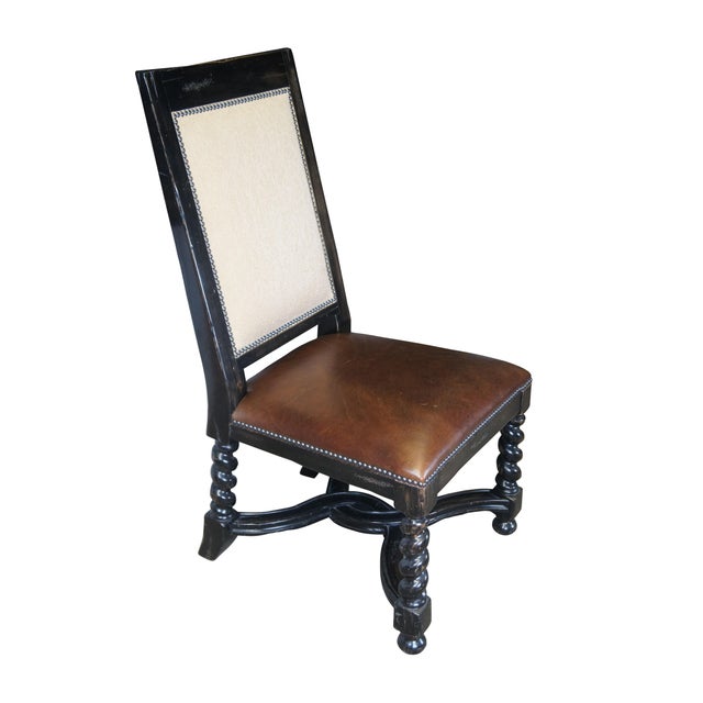 Late 20th century Lorts Manufacturing Renaissance Revival Dining Chairs. Features a naturally distressed dark brown...