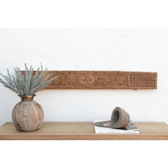 Uncover a piece of history with this authentic architectural carving, salvaged from the structures of 19th-century India....