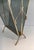 This pair of faux bamboo magazine racks are made of bronze with blueish glass panels on each side. This is a French work...