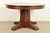 An outstanding antique Mission or Arts & Crafts period quarter sawn oak split pedestal extension dining table In the...