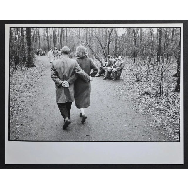 Early spring in Cologne City forest, Germany 1954. Keywords: Germany; people; coat; couple; springtime; early 1950s; park;...
