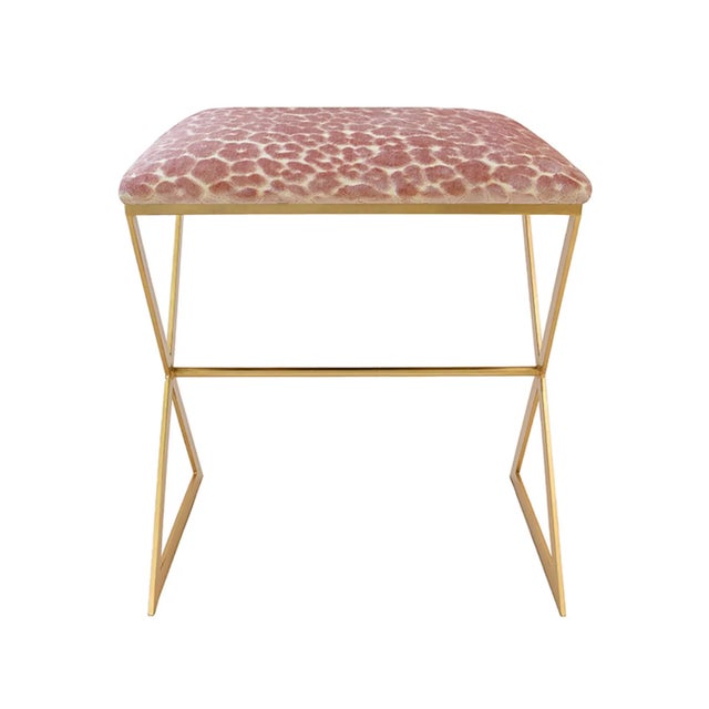 X marks the spot for style! The X Side stool, with its gold leaf frame and cushion in luxe pink leopard print upholstery...