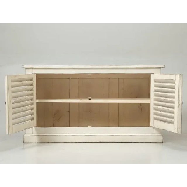 Country French Louvered low cabinet, that we found along the Route de Fougères in Northern France. Our opinion is, that...