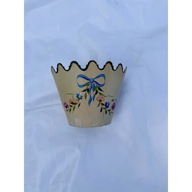 This listing is for a vintage, 1990s toleware, cachepot by Jane Keltner for Two's company. It features a scalloped rim and...