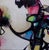 Jitterbug features an energetic interplay of bold colors and dynamic shapes, creating a sense of movement and spontaneity....