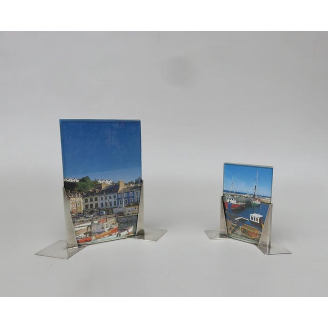 A few silver -plated, typically strict and minimalist formal language of the art deco, picture frame made by wmf. The...