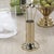 Add a touch of charm to your entertaining with the Evil Eye 4-Piece Cocktail Pick Set. Crafted from polished brass and...