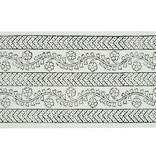 Block printed by hand, this tape features alternating chevron stripes that frame lovely floral vines and adds an artisanal...