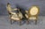 This elegant pair of French Louis XVI style armchairs embodies the timeless refinement and restrained luxury that have...