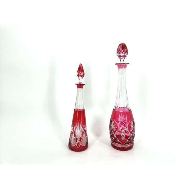 Gorgeous and elegant caraffes/decanters by Belgian Glass maker Val Saint Lambert. Beautiful colour. Very good condition....