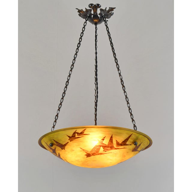 Charles Schneider - Le Verre Français A large French art deco hanging fixture in wrought iron with a nice Schneider Le...