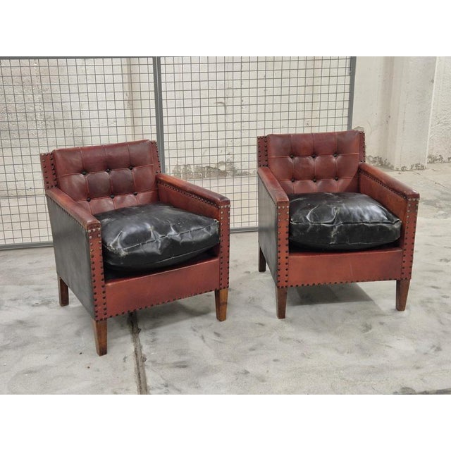 Club chairs, in leather, style/attr. to Otto Schultz, Sweden 1930/40s Patina, signs of wear and age.