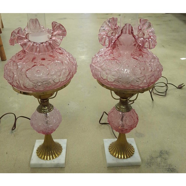 A pair of Mid Century vintage Fenton "Gone With the Wind" lamps in pink custard satin glass with a cabbage rose / poppy...