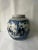 A beautiful blue and white finished porcelain ginger jar with the hand painted human figures. This lidded jar is not just...