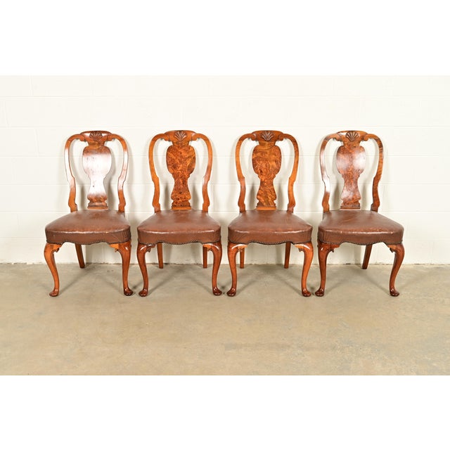 An outstanding set of four antique English Georgian or Queen Anne dining chairs In the manner of Baker Furniture England,...