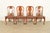 An outstanding set of four antique English Georgian or Queen Anne dining chairs In the manner of Baker Furniture England,...