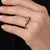 This elegant vintage diamond east west ring is a distinctive 1970’s design, centered by a GIA-certified cushion brilliant...