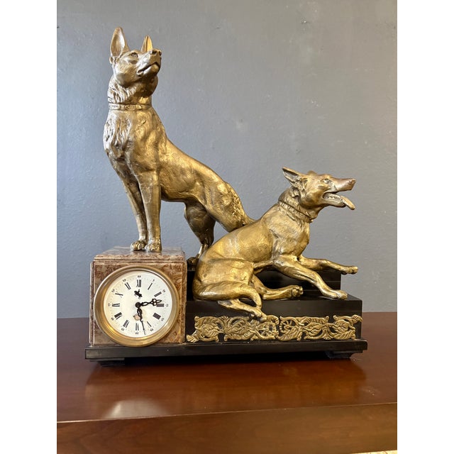 French Artist Louis Albert Carvin, Born in Paris, 1875-1951. This Art Deco, Ca. 1930 clock with a stylized base, has 2...